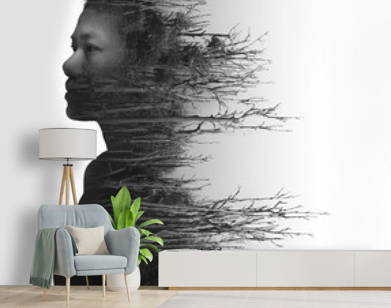 Dubbel belichtingsportret van jonge vrouw en gedroogd bos