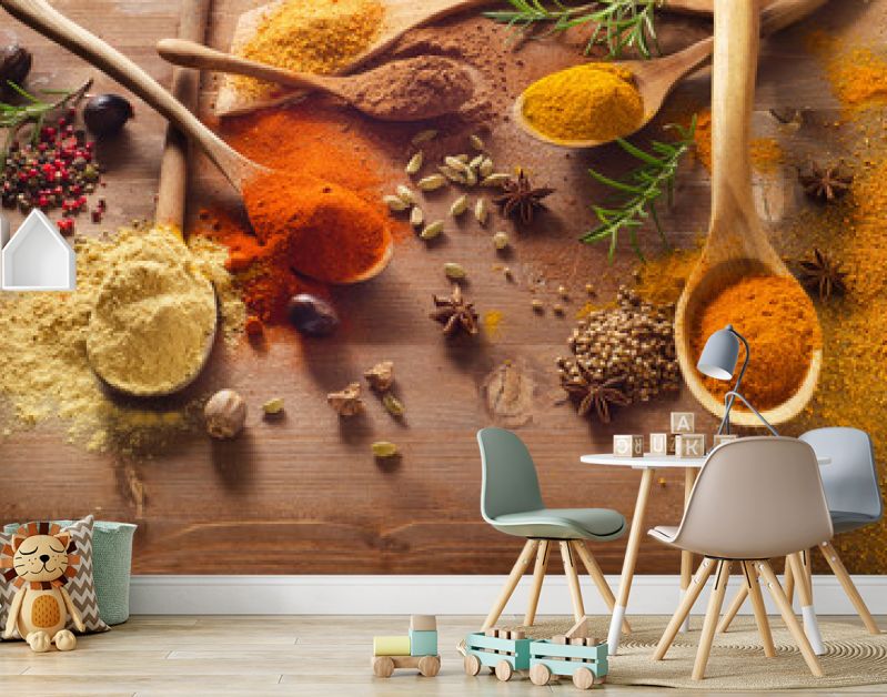 Various spices on wooden board.