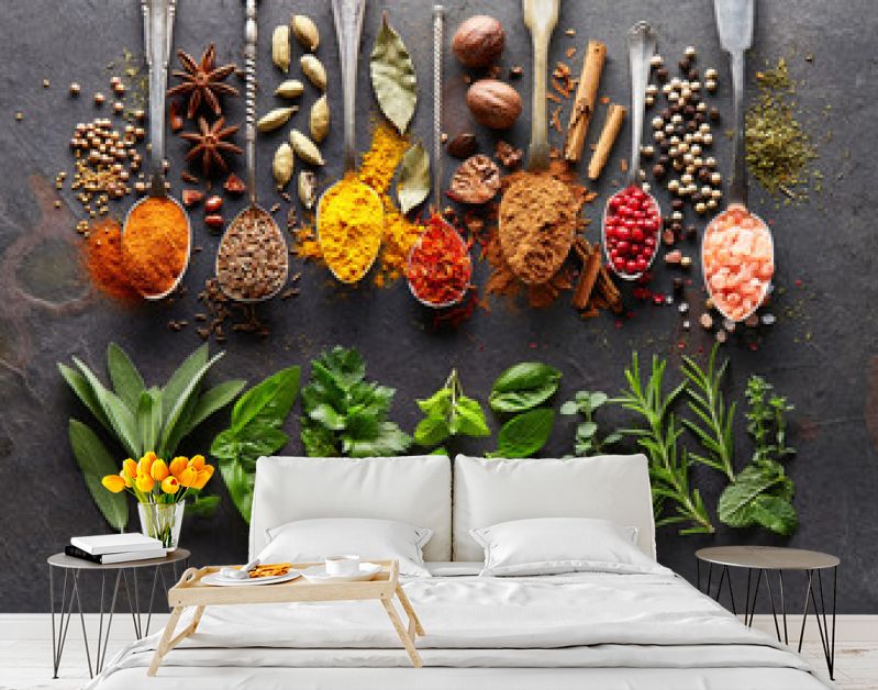 Spices and herbs on black board