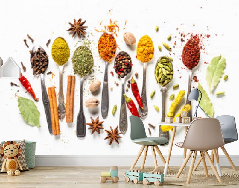 Set of various spices in spoons on white