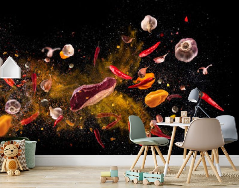 Hot red pepper, garlic, different spices powder meat stakes flying on a black background Motion freeze photo composition