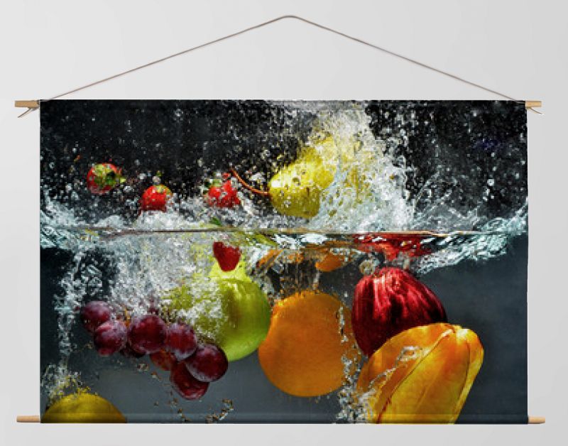 Fruit and vegetables splash into water