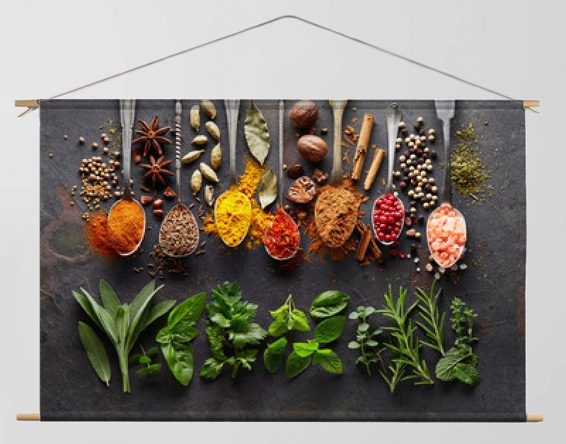 Spices and herbs on black board