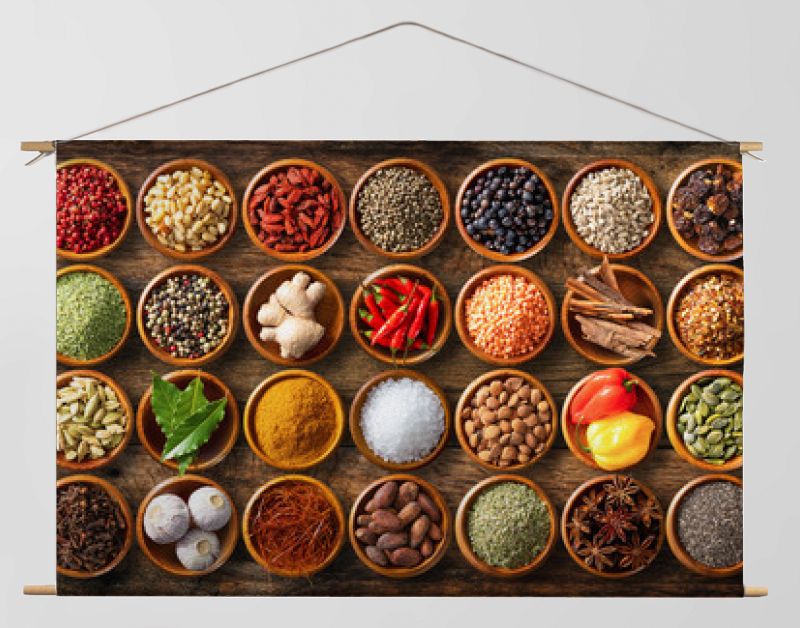 Colourful background from various herbs and spices for cooking in bowls