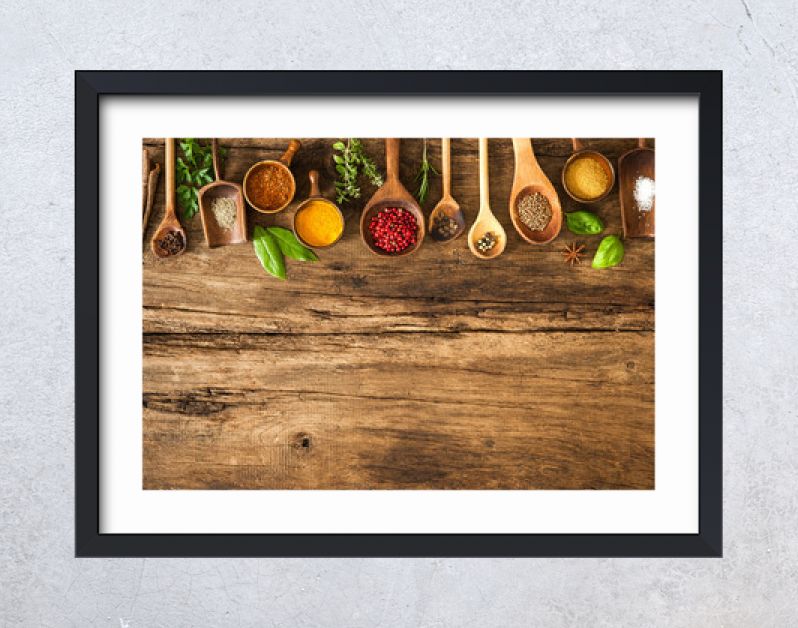 Colorful spices on wooden table