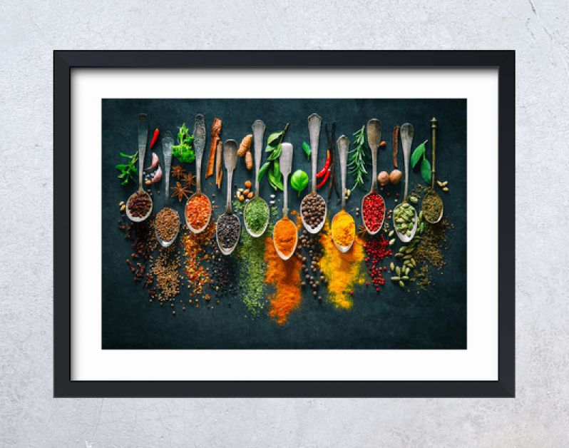 Herbs and spices for cooking on dark background