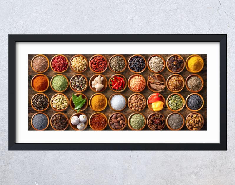 Colourful background from various herbs and spices for cooking in bowls