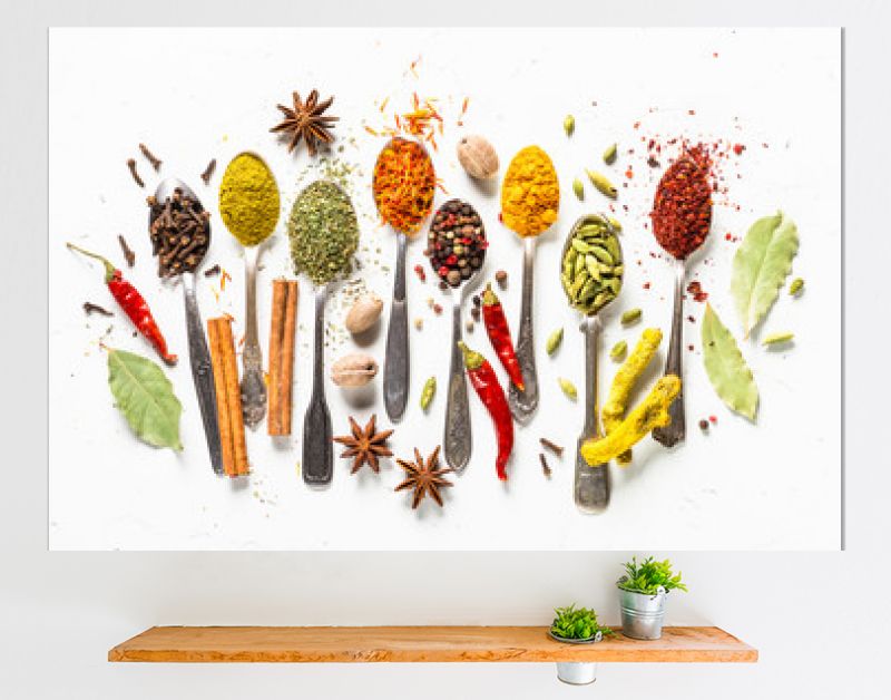 Set of various spices in spoons on white