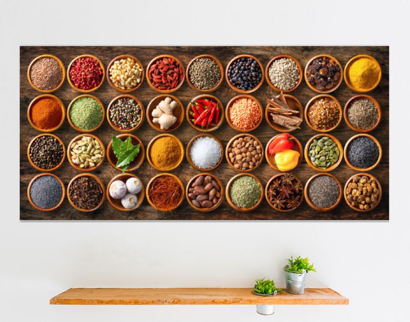 Colourful background from various herbs and spices for cooking in bowls