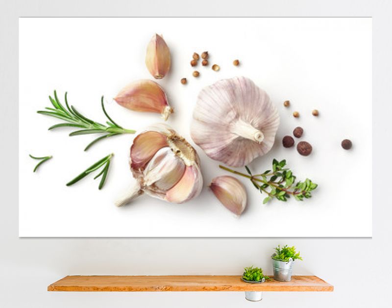 garlic and herbs on white background