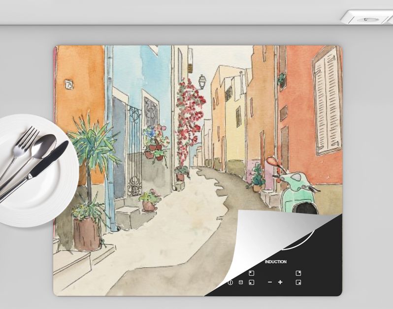 Groene scooter in smalle mediterrane straat