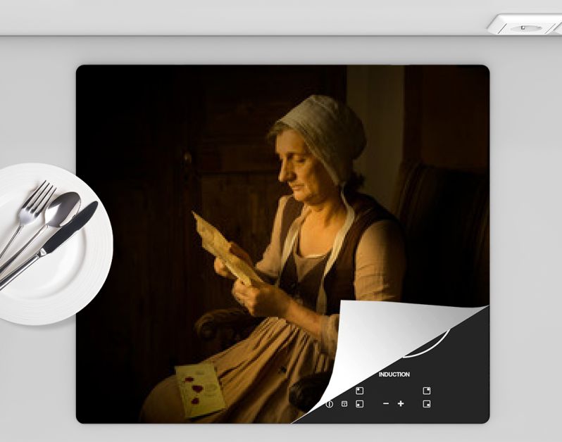 Rembrandt portret van lezende vrouw